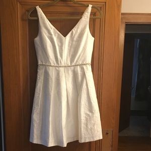 White dress with pearl embellishment